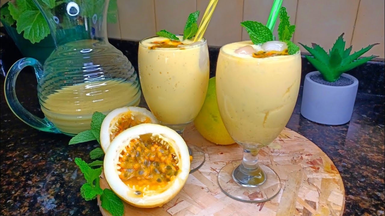 Fresh passion fruit smoothies served in glasses with mint garnish.