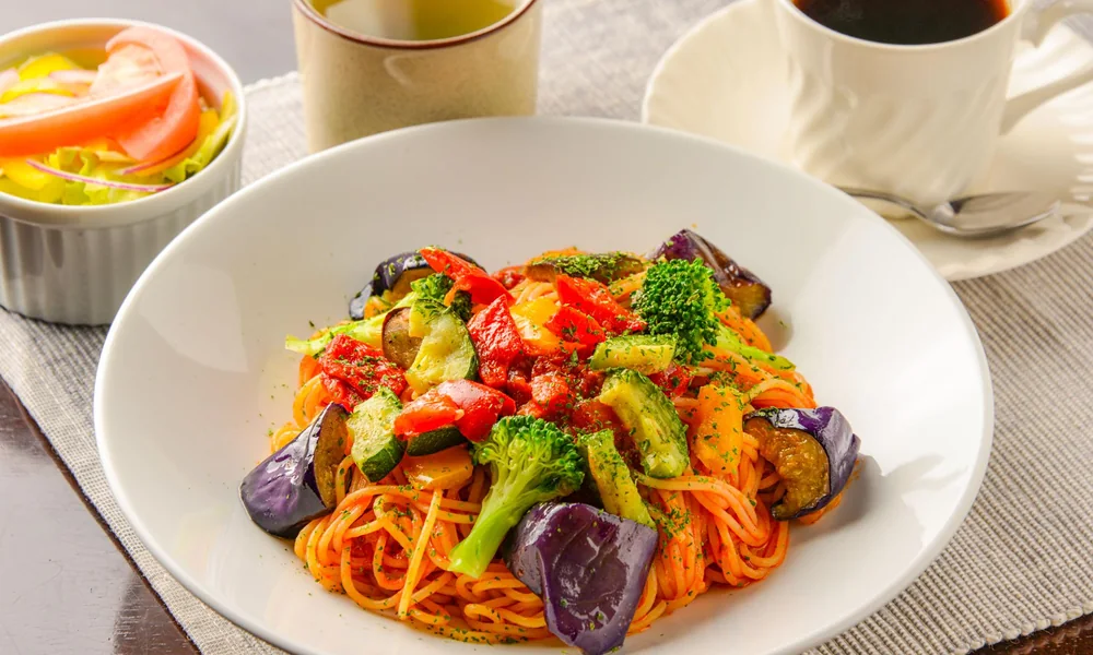 Peeacelily | Olive Garden: A Guide to the Menu, Dining, and Ordering Bowl of vegetarian vegetable pasta loaded with roasted eggplant, broccoli, and red peppers